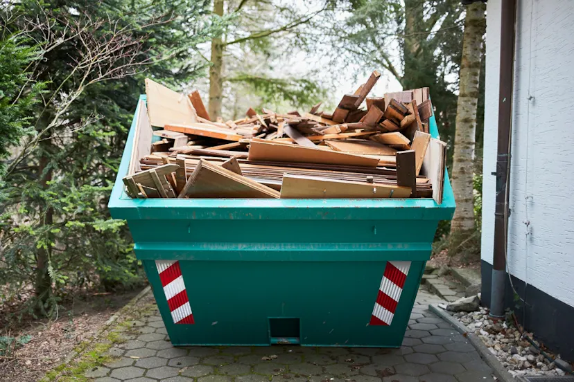 Building waste and wood in a dumper in Essex UK